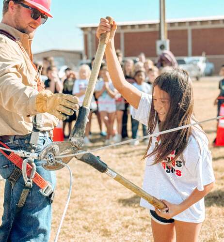 landon-with-kid-trying-to-cut-wire